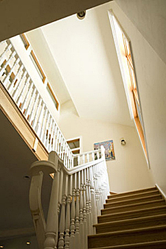 Central staircase with clerestory windows.