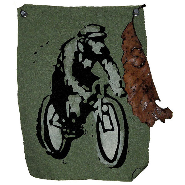 Image of man on bike and dry leaf
